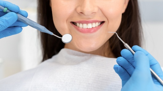 gallery/close-up-of-smiling-woman-attenting-dental-clinic-kazfwbk